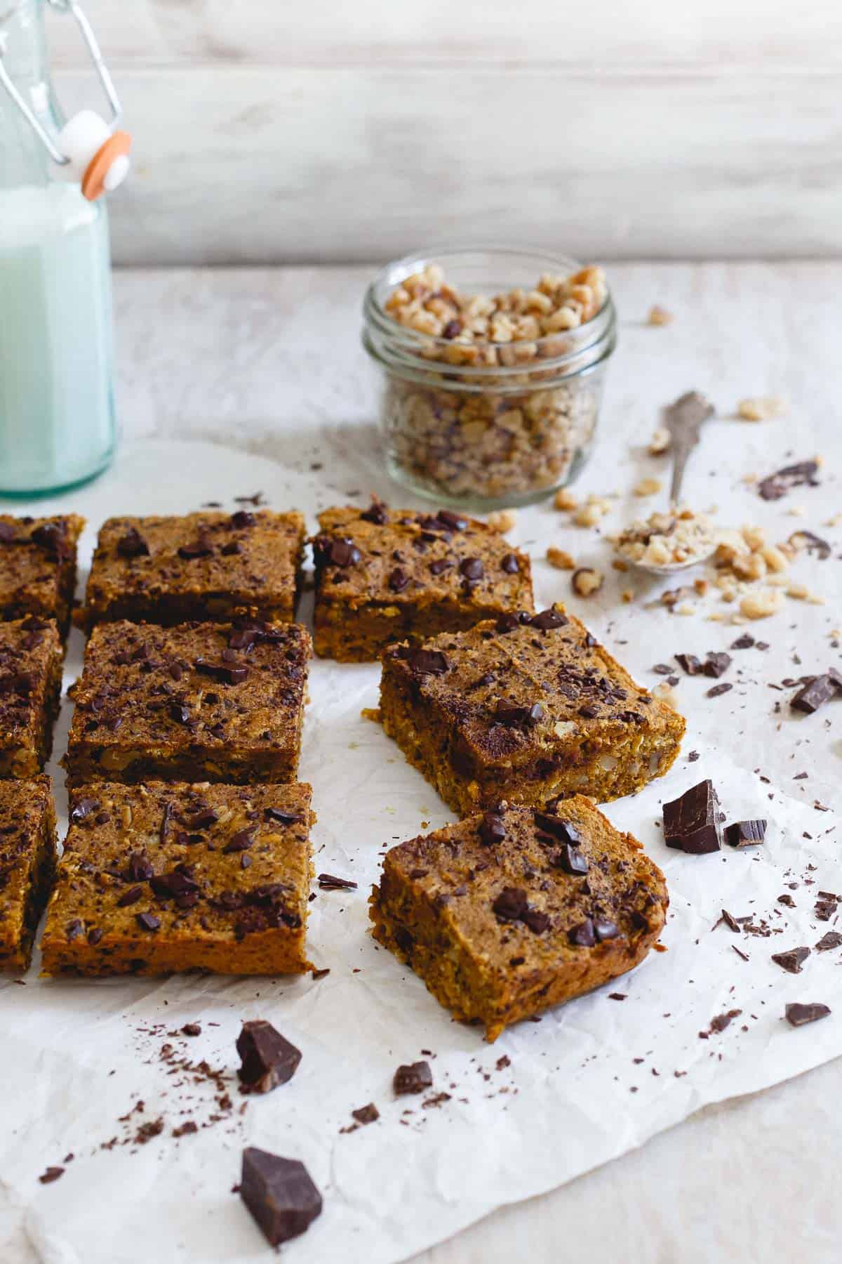 These pumpkin chocolate chip bars are a quick and easy fall treat. They're chewy, dense and perfect with a cold glass of milk.