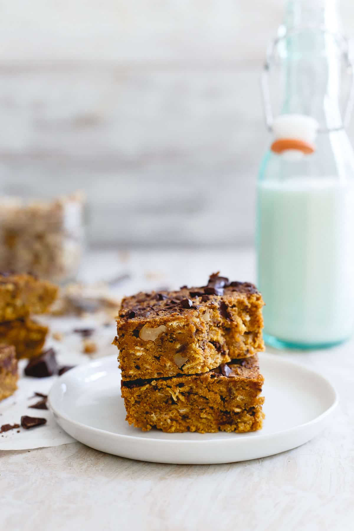 You'll love the chewy, dense bite of these pumpkin walnut chocolate chip bars for the perfect fall sweet.