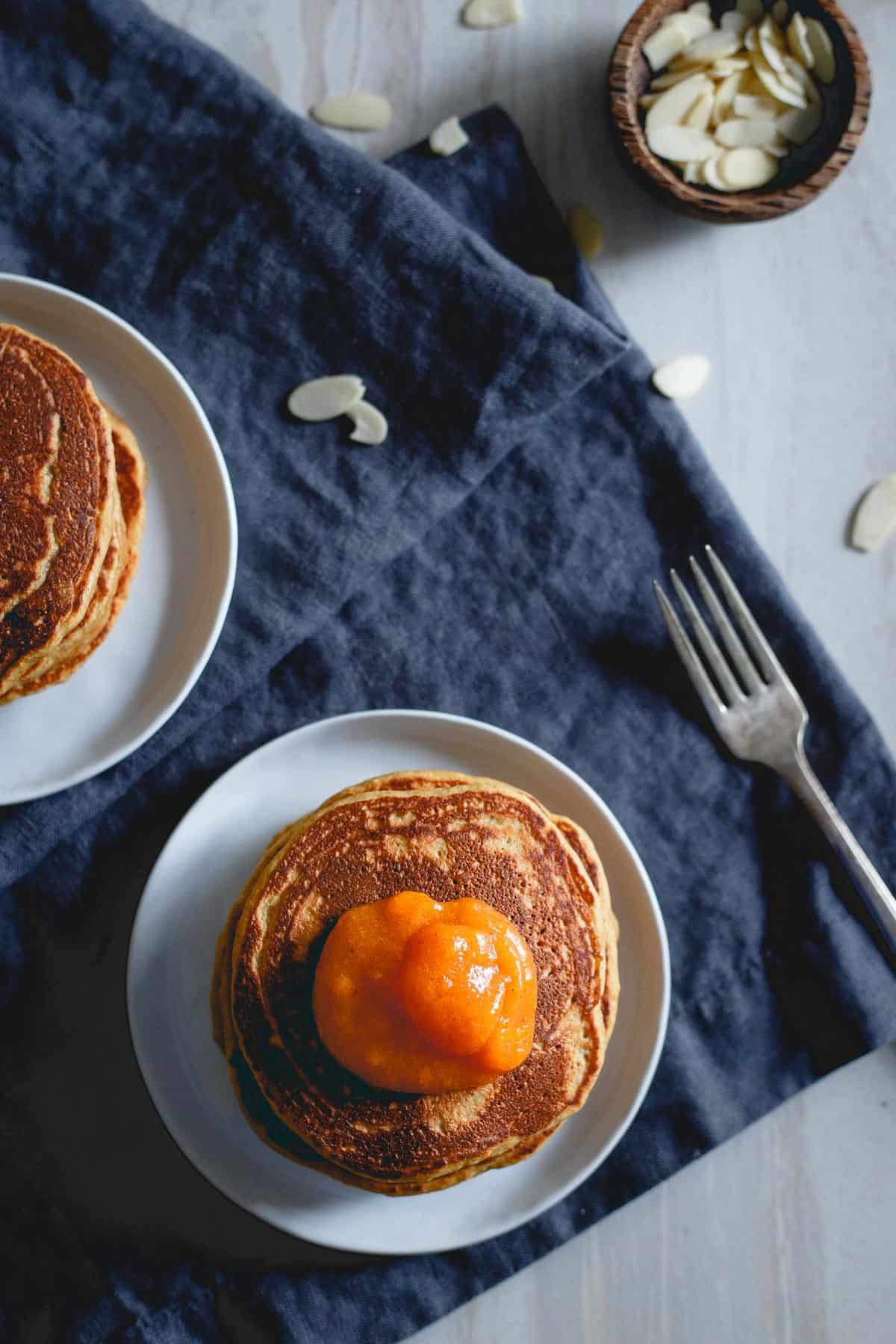 These persimmon pancakes are made with the pulp of the sweet persimmon fruit and full of almond flavor. They're a delicious winter breakfast!