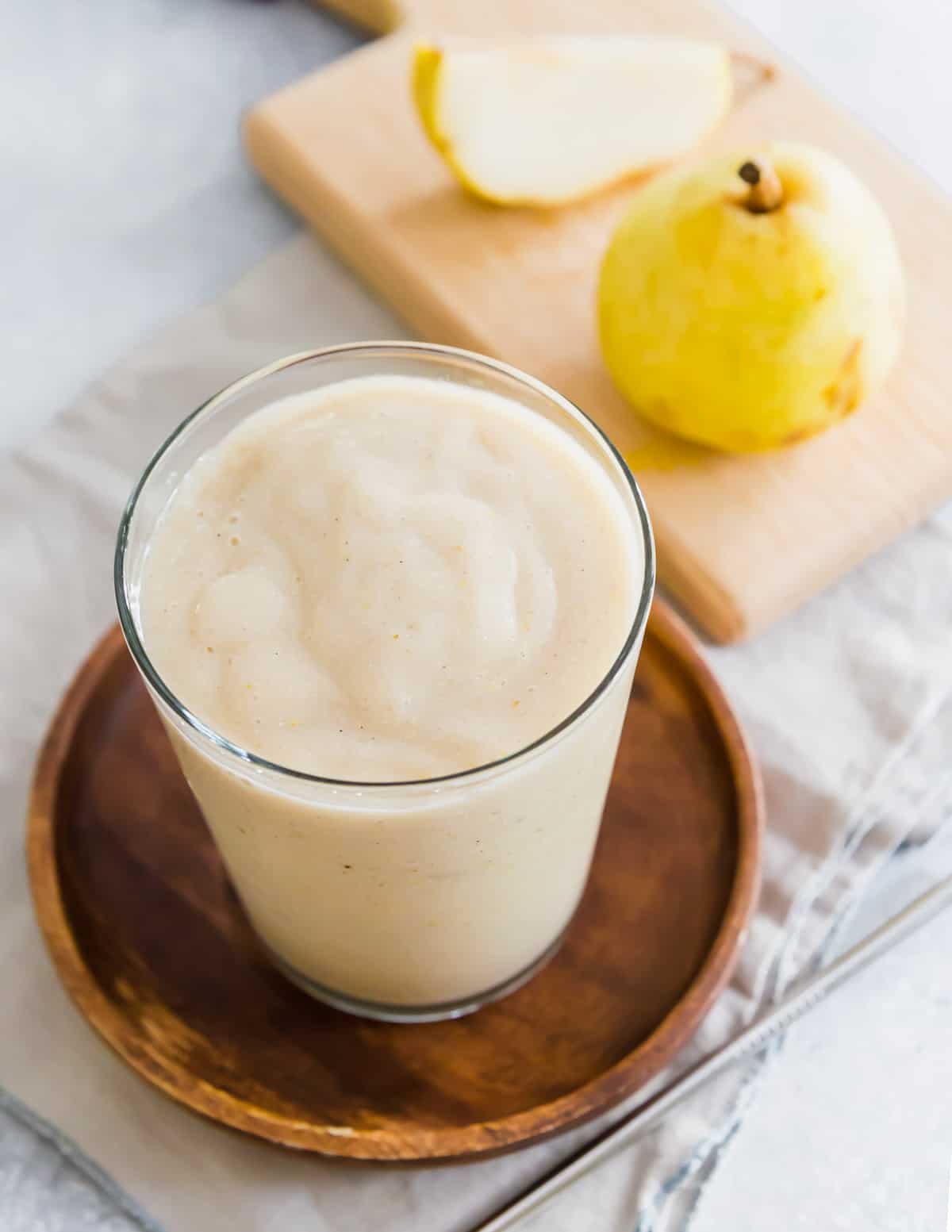 This easy pear smoothie is flavored with banana and cinnamon. It's a healthy, high protein snack or breakfast you can make in minutes with just a handful of ingredients.