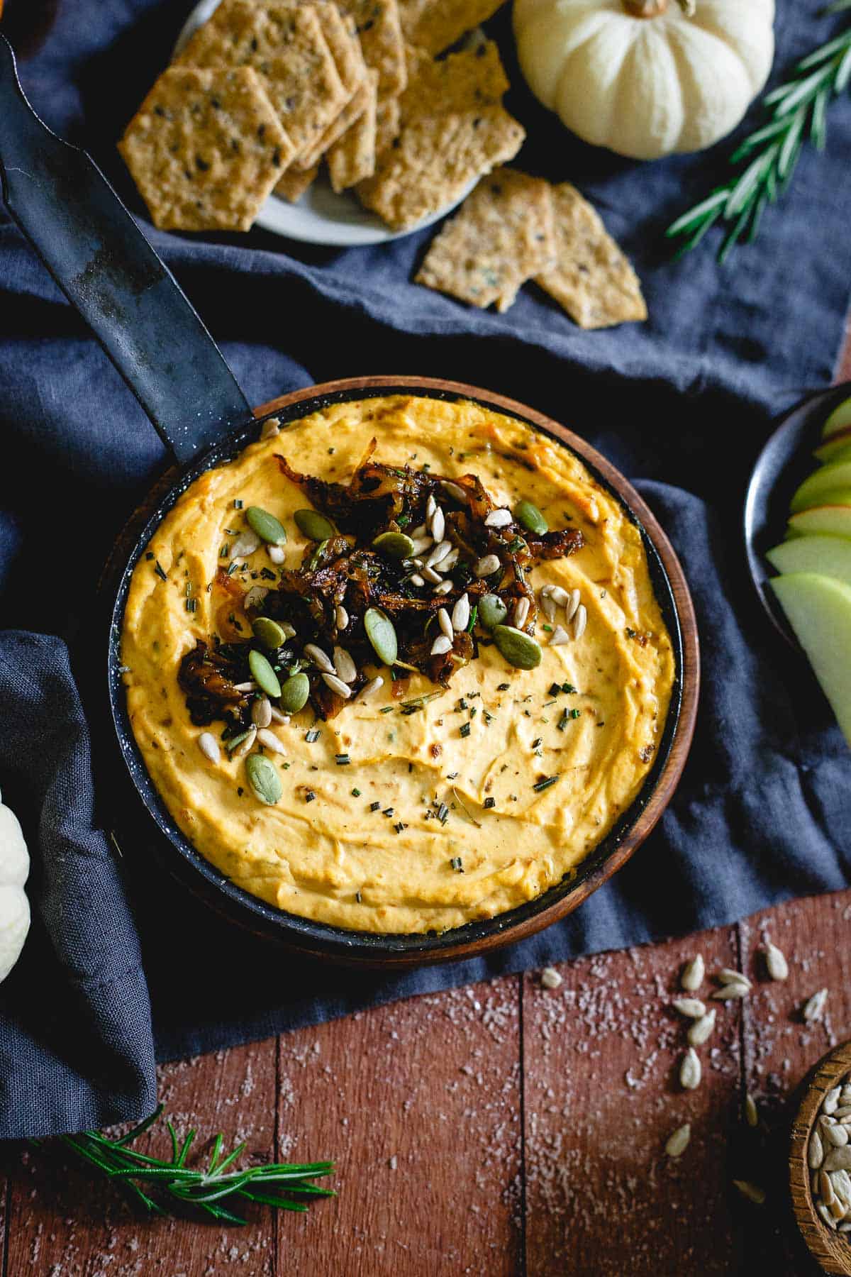 This creamy pumpkin goat cheese dip is bursting with savory caramelized onions. Serve it hot or cold for a great fall appetizer!