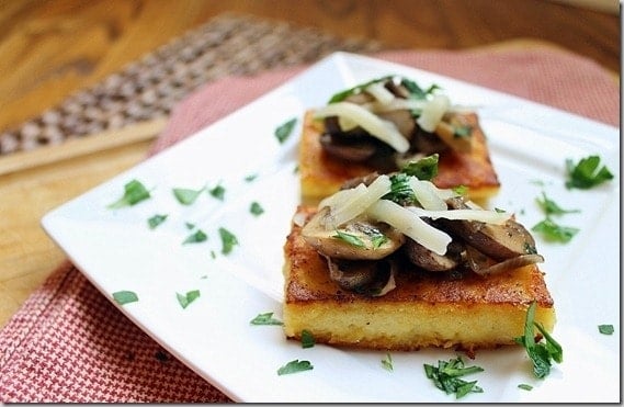 Pan fried polenta cakes are crispy and delicious topped with a simple mushroom ragu.