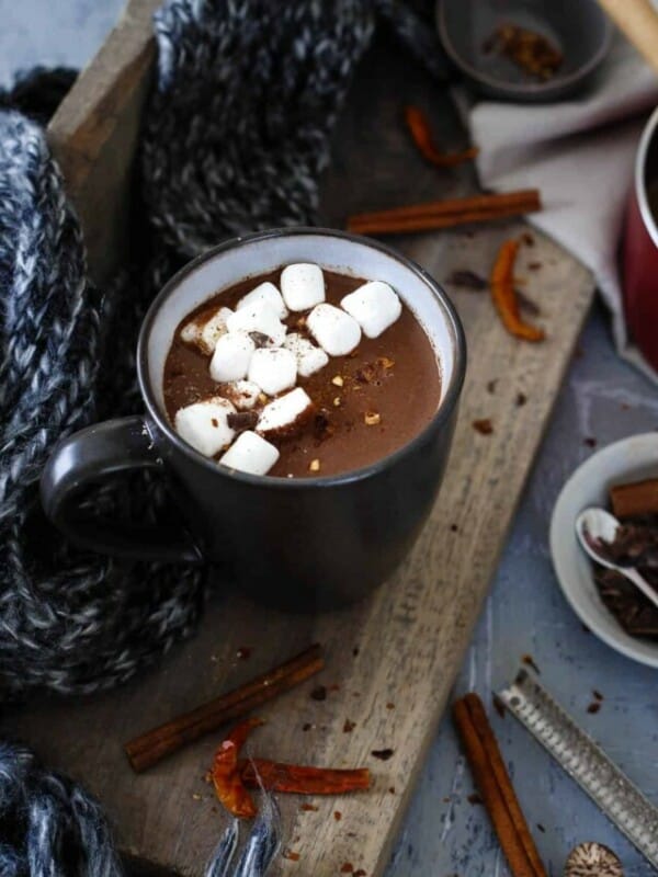 Hot chocolate with marshmallows on a wooden table.