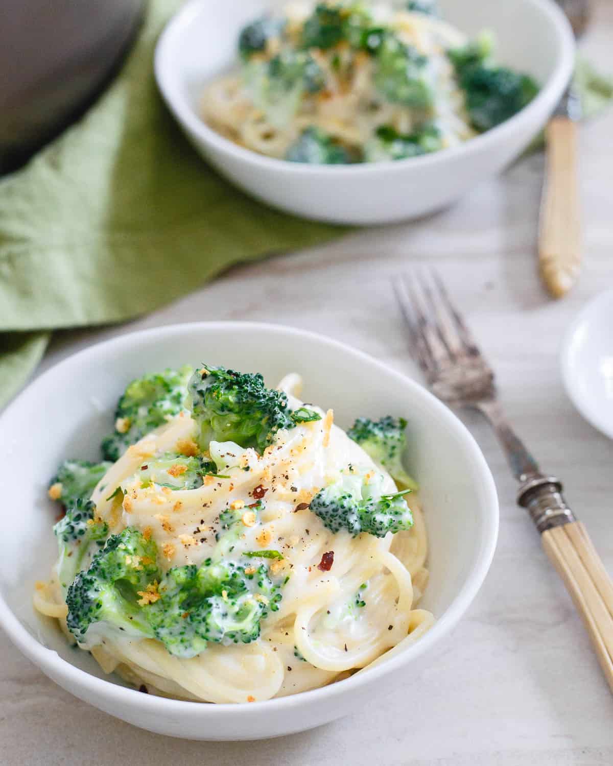 This lightened up spaghetti alfredo with broccoli is creamy, cheesy and decadent but much healthier than the original so you can feel good about eating it.