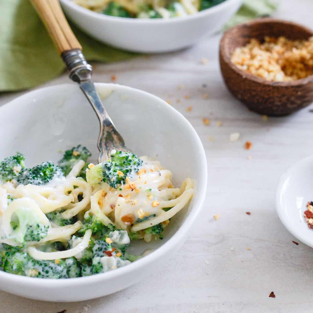 Creamy, cheesy and super decadent, you'll never know this lightened up spaghetti alfredo is a healthier spin on the classic pasta dish.