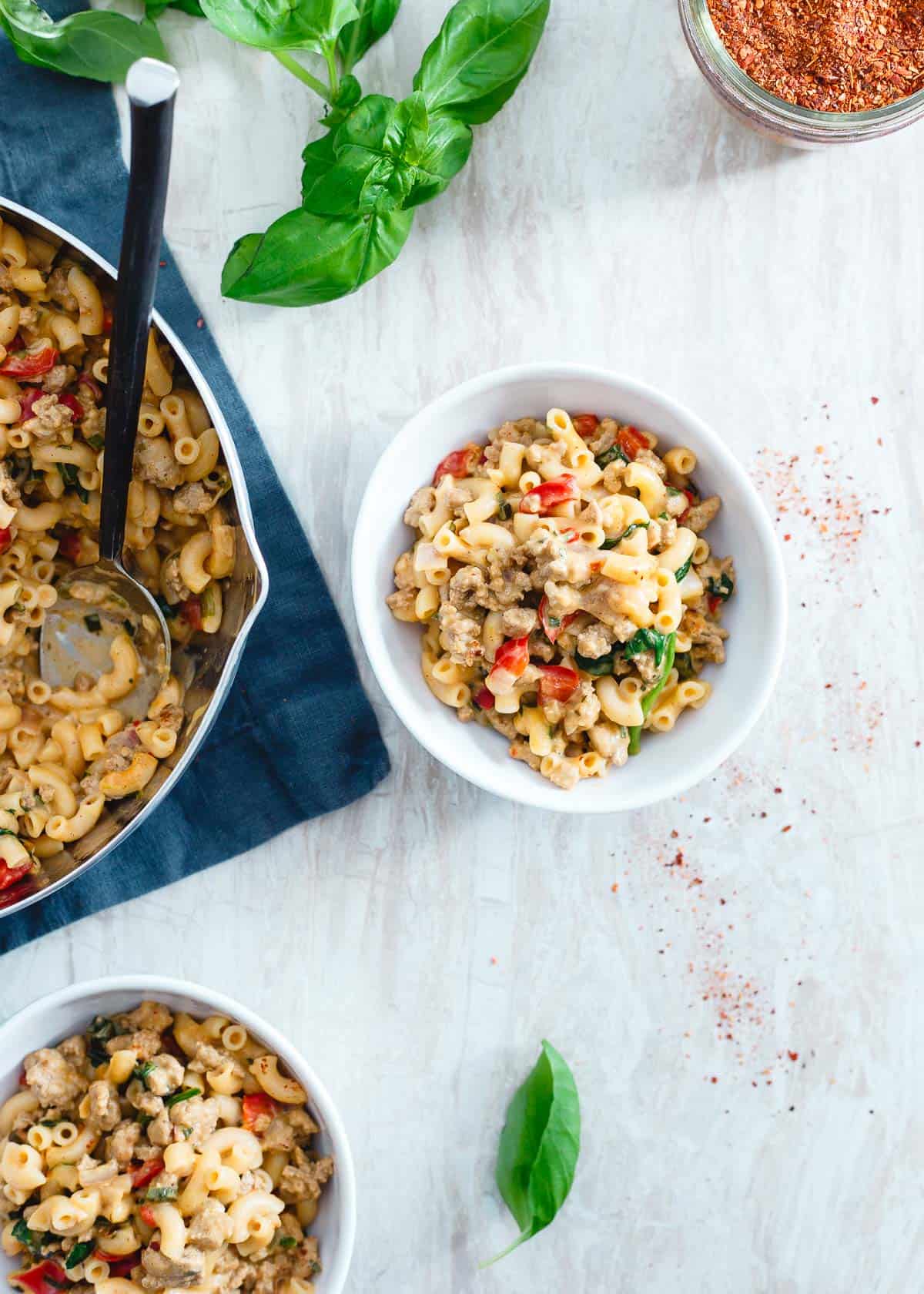 Filled with spinach and peppers and tossed in a creamy read cheddar cheese sauce, this turkey skillet mac and cheese is an easy weeknight dinner everyone will love.