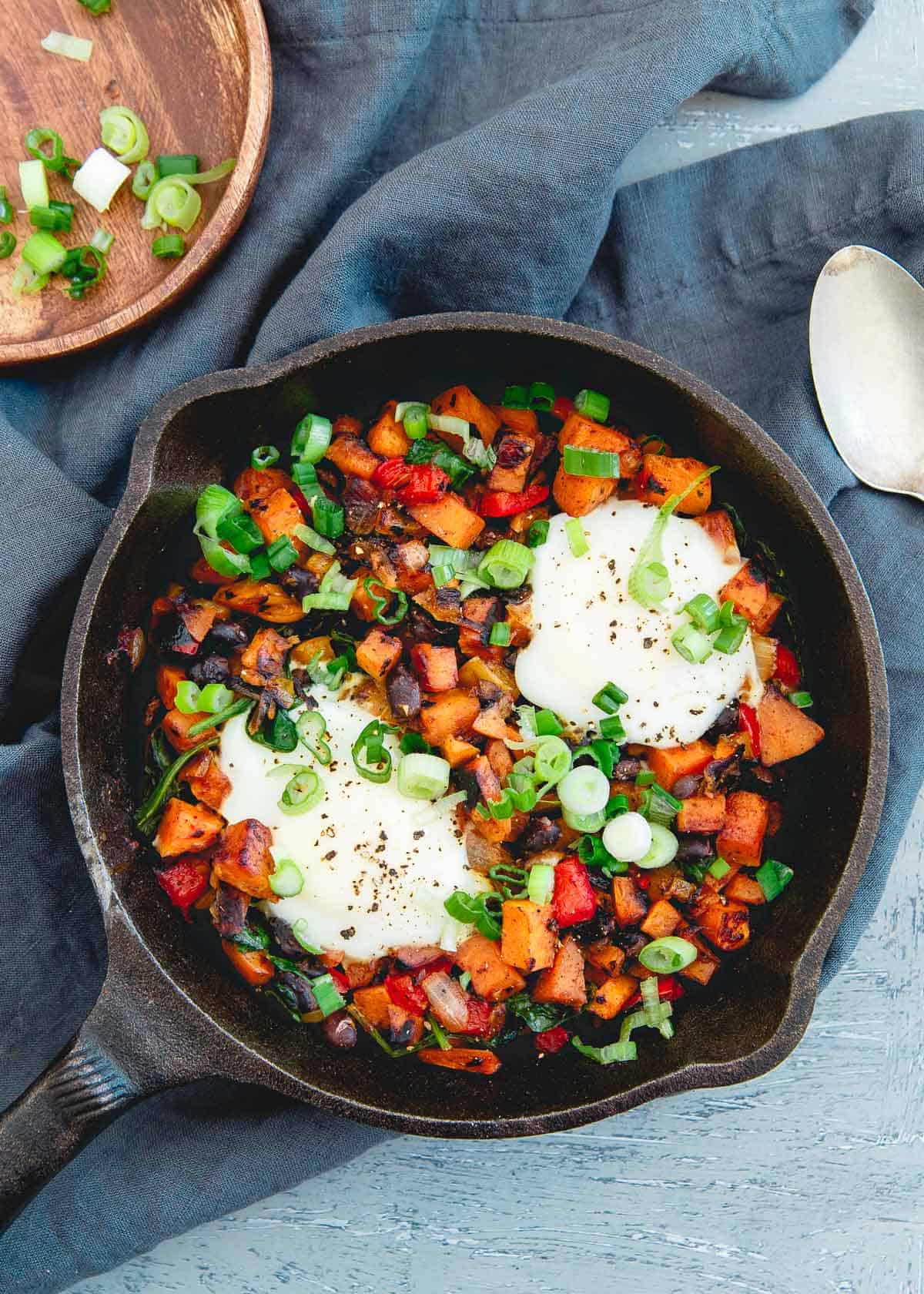This is a quick Mexican inspired sweet potato hash with a spicy harissa kick. Super simple and makes the perfect breakfast, lunch or dinner!