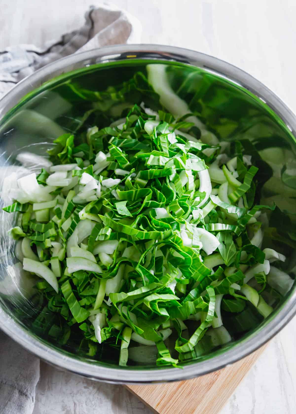 thinly sliced baby bok choy for a raw bok choy salad
