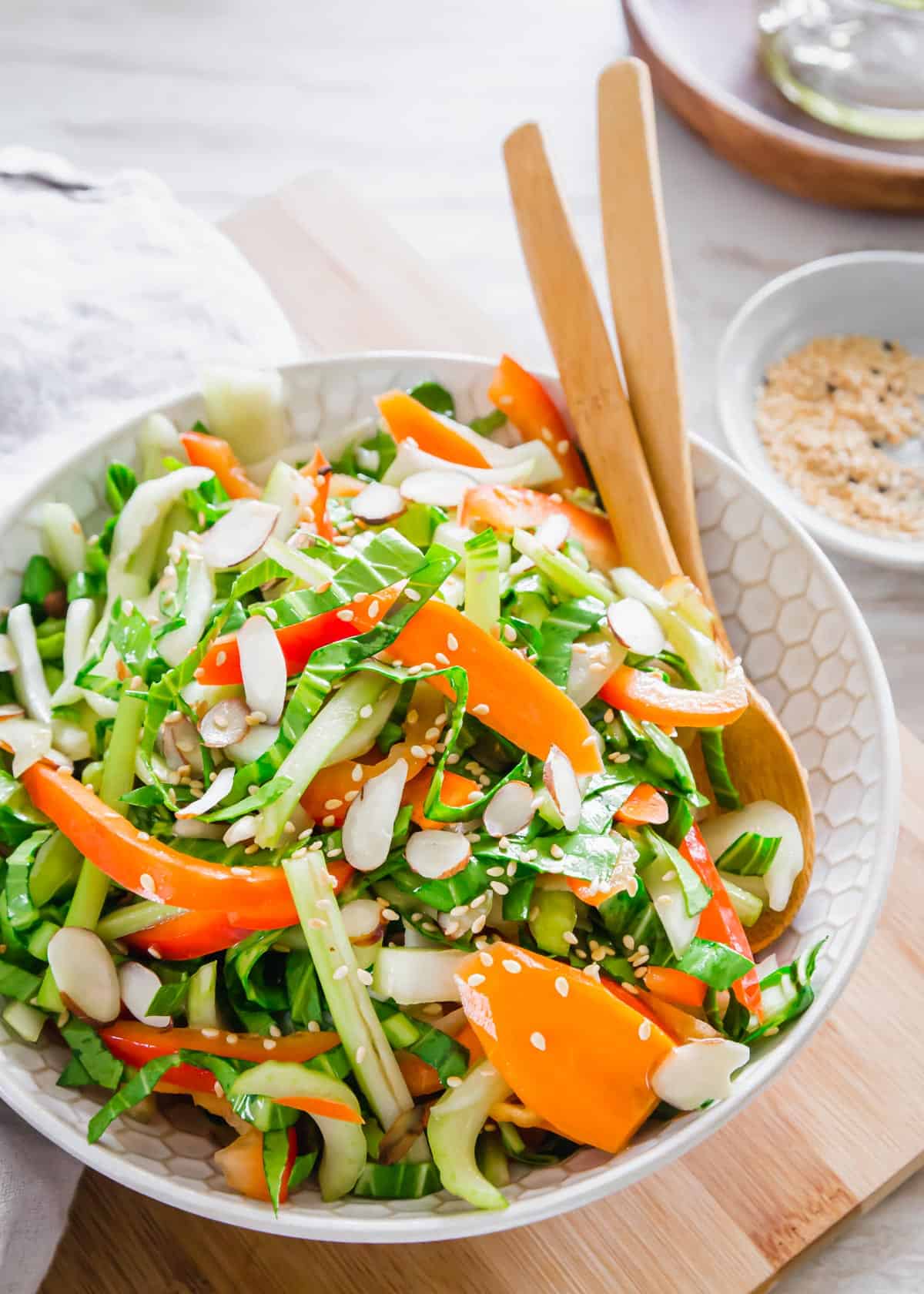 Crispy and crunchy bok choy salad with red peppers and carrots in an Asian inspired sesame soy dressing.
