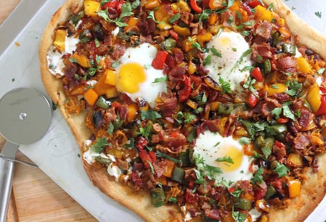 Breakfast pizza with bacon and eggs