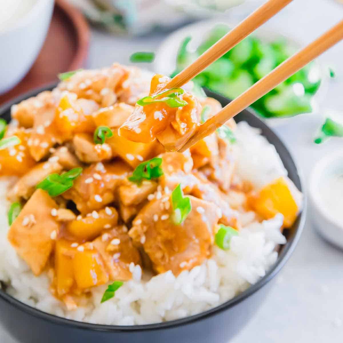 Crockpot honey garlic chicken with pineapple in a sticky, sweet and savory sauce.