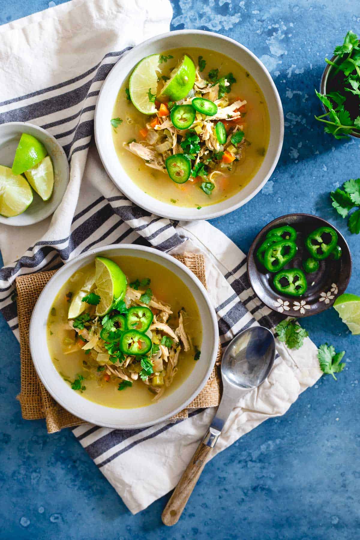 This spicy chicken lime soup is like chicken noodle meets chicken tortilla soup for a spicy, noodle-less middle ground perfect for a cold winter day.