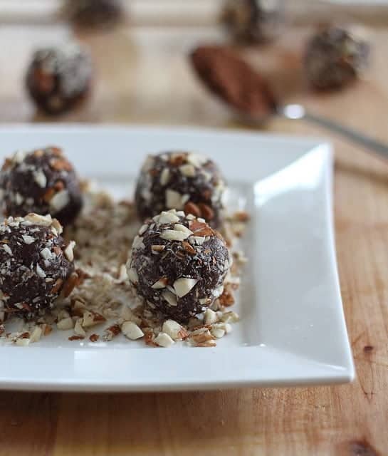 These easy and healthy chocolate almond truffles are made with almond butter and dates for a paleo spin on an indulgent classic. They make a great Valentine's Day treat!