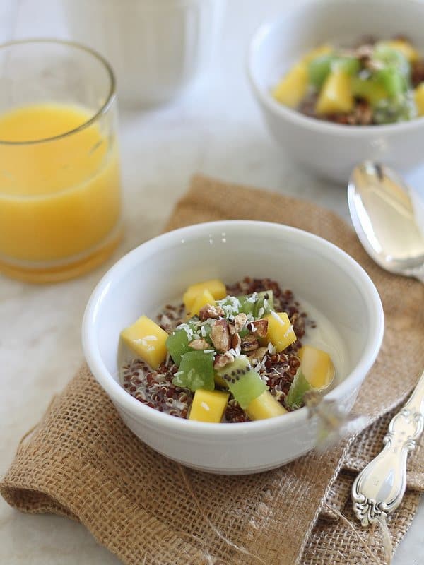 Breakfast quinoa with mangos and kiwis