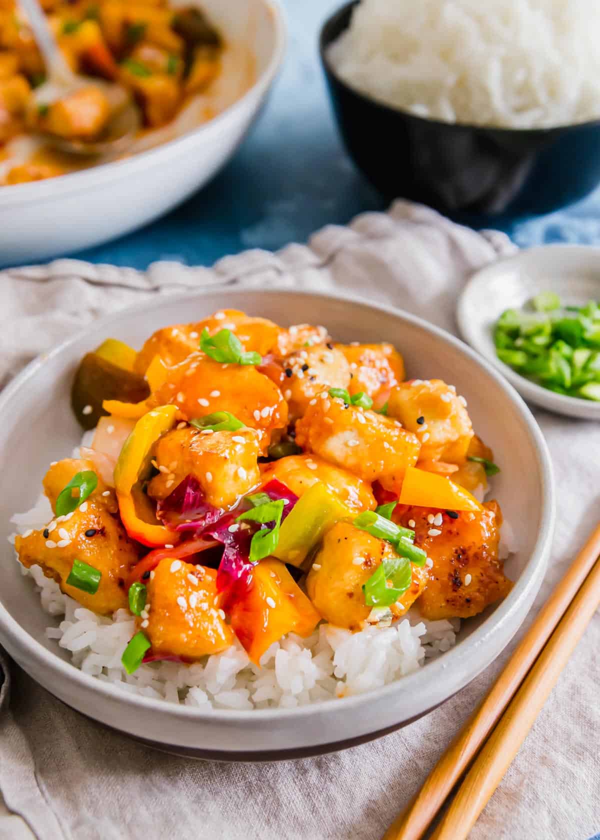 Make this sweet and sour tofu in under 30 minutes! Crispy tofu and a sticky sweet & sour sauce mimic the classic Chinese takeout dish in this vegetarian friendly meal.