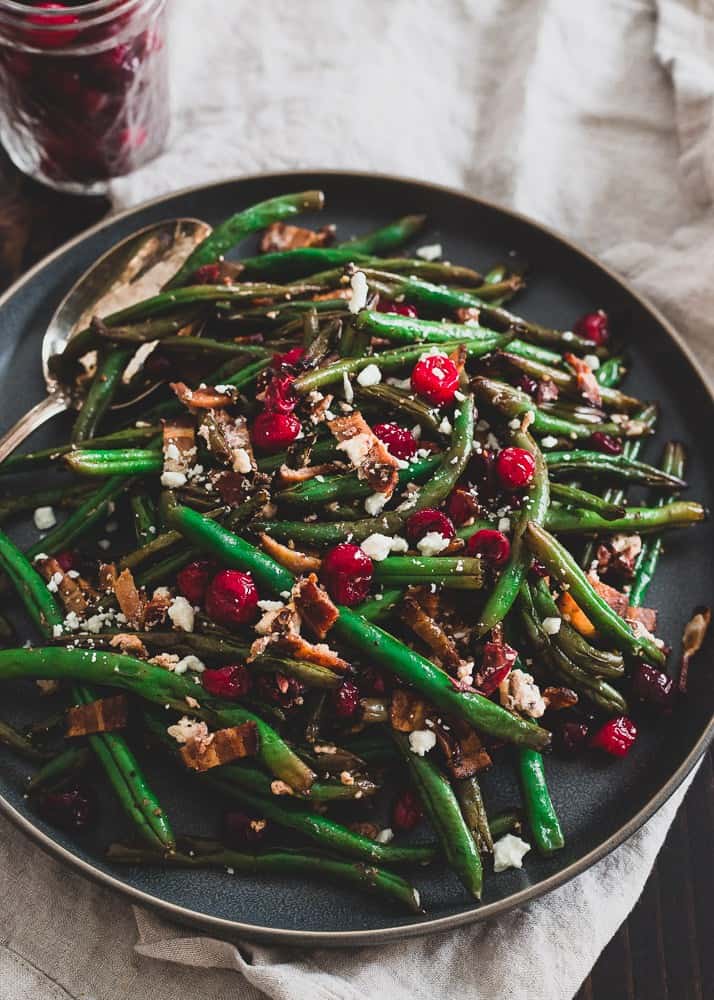 These green beans with cranberries, bacon and goat cheese are a healthy addition to your Thanksgiving table that doesn’t skimp on flavor. These green beans with cranberries, bacon and goat cheese are a healthy addition to your Thanksgiving table that doesn’t skimp on flavor.