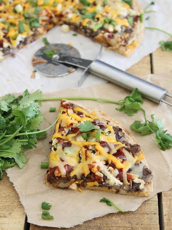 This BBQ black bean tortilla pizza makes a great appetizer or a tasty cheesy dinner.