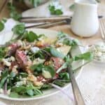 Steak and pear watercress salad with shallot dressing.