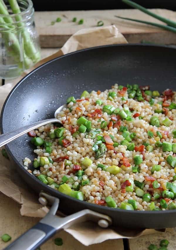 This bacon and asparagus fried couscous is pan fried in bacon fat for a delicious spin on fried rice.