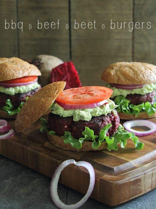 BBQ beef and beet burgers topped with avocado and goat cheese