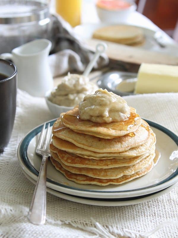 Coconut ricotta pancakes with caramelized banana creme fraiche butter