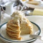 Coconut ricotta pancakes with caramelized banana creme fraiche butter.