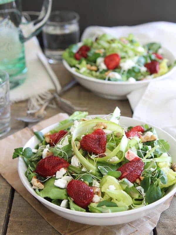 Roasted strawberry salad with feta, watercress and asparagus.