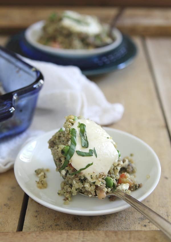 Pesto quinoa bake with ground beef and melted mozzarella, a healthy casserole everyone will love.