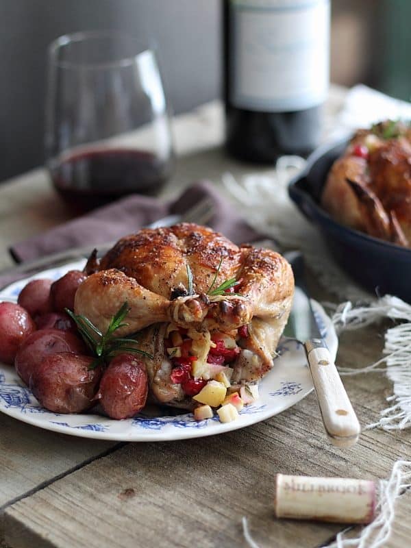 Cranberry apple rosemary stuffed cornish hens is a winter inspired alternative to roasted chicken, try it for your special weekend meal!