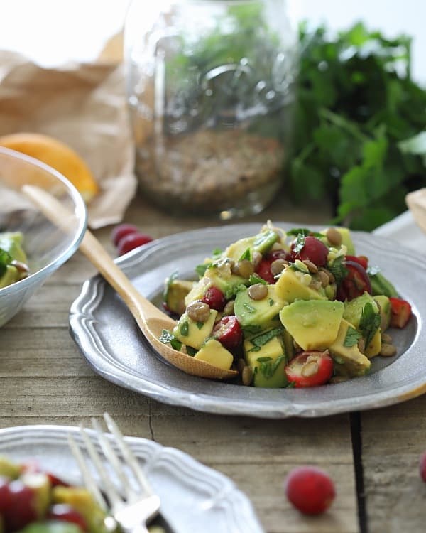 This salad is packed with avocado, cooked lentils and both fresh and dried cranberries tossed with a lemon dijon dressing to make this a hearty lunch or side salad.