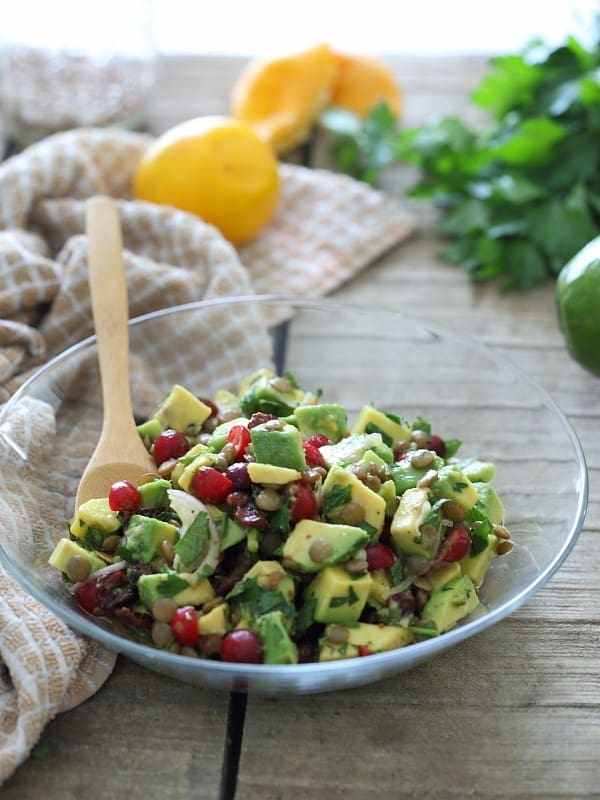 This salad is packed with healthy fats from a good dose of avocado. Cooked lentils and both fresh and dried cranberries are tossed with a lemon dijon dressing to make this a hearty lunch or side salad.