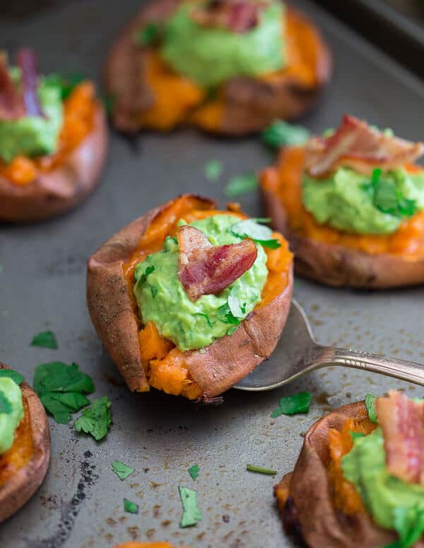 These smashed sweet potato guacamole bites have crispy sides with soft centers. Topped with a crispy piece of salty bacon.