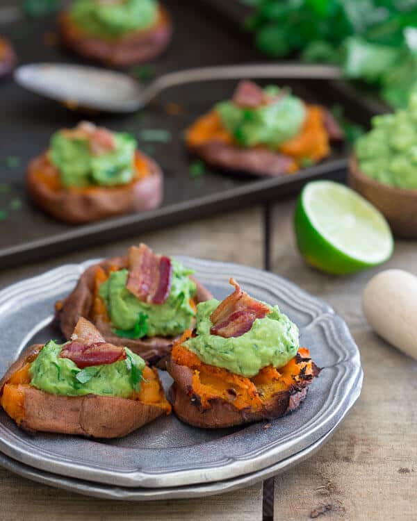These smashed sweet potato guacamole bites have crispy sides with soft centers. They're the perfect game day bite.