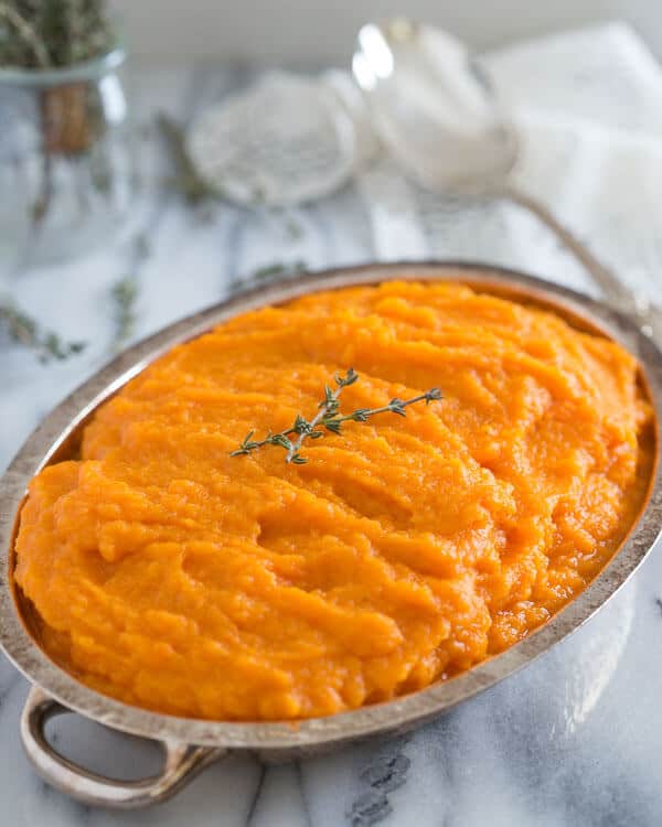 Carrot parsnip puree in a small dish. Carrot parsnip puree in a small dish.