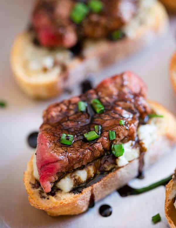 These Blue Cheese Steak Crostini bites make the perfect appetizer for any special occasion or party with creamy blue cheese and thinly sliced rare steak.