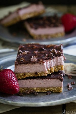 Strawberry cream bars on a plate.