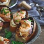Lemon burrata crostini with grilled shrimp.