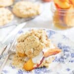 Paleo peach shortcake on a blue plate.