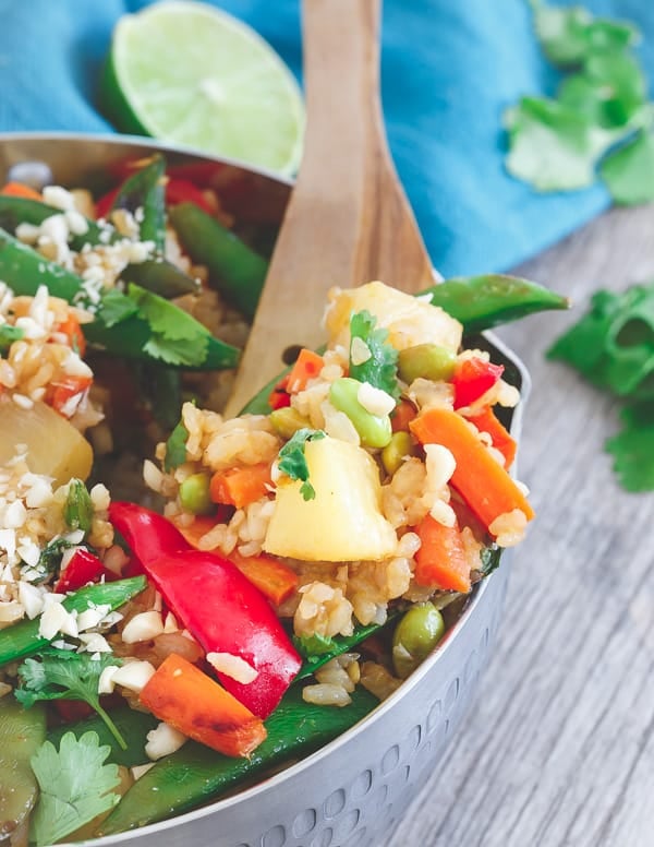 This Thai pineapple fried rice is loaded with Thai flavors, sweet pineapple and lots of Asian style vegetables.