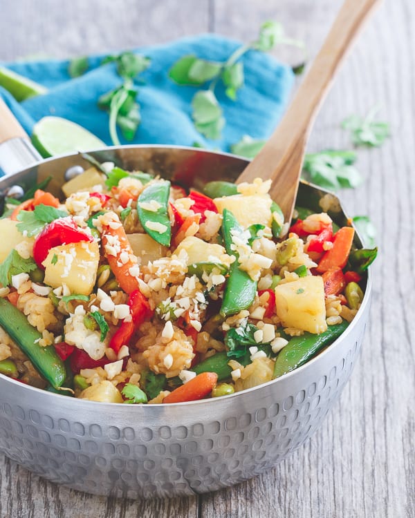 This Thai pineapple fried rice is loaded with Thai flavors, sweet pineapple and lots of Asian style vegetables for a meatless meal.