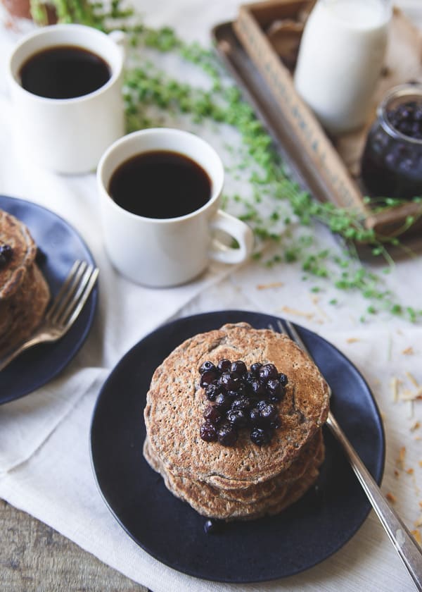 These cinnamon raisin oat bran pancakes have a combination of oat bran and buckwheat for a hearty texture with a touch of nutty toasted coconut. Top with your favorite fruit compote for a deliciously healthy start to your day.