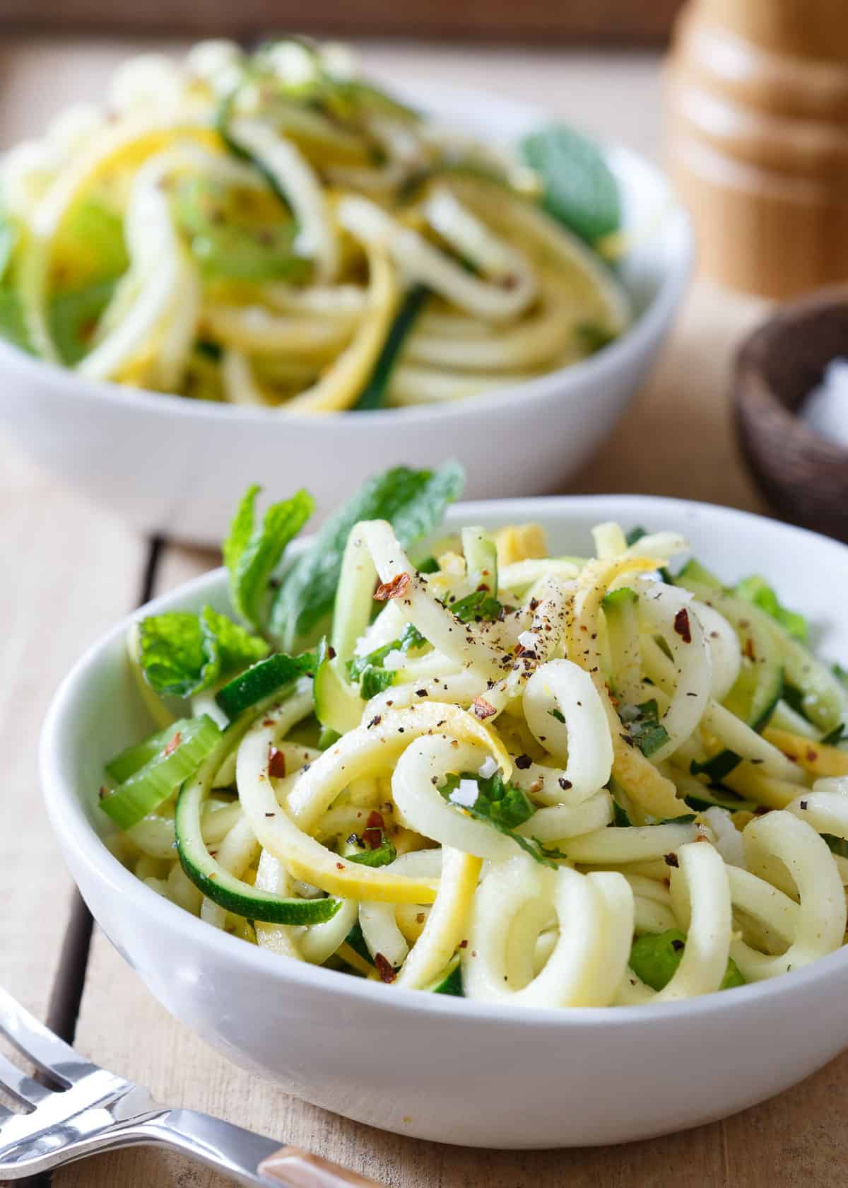 Basil and Mint Squash Noodles are a summertime staple full of flavor and fiber without any grains.