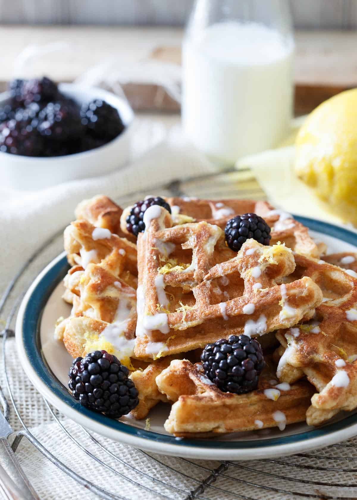 This lemon vanilla waffle French toast takes two of your favorite breakfast foods and combines them into one delicious way to start the day!