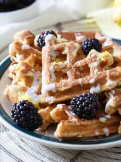 This lemon vanilla waffle French toast takes two of your favorite breakfast foods and combines them into one delicious way to start the day!