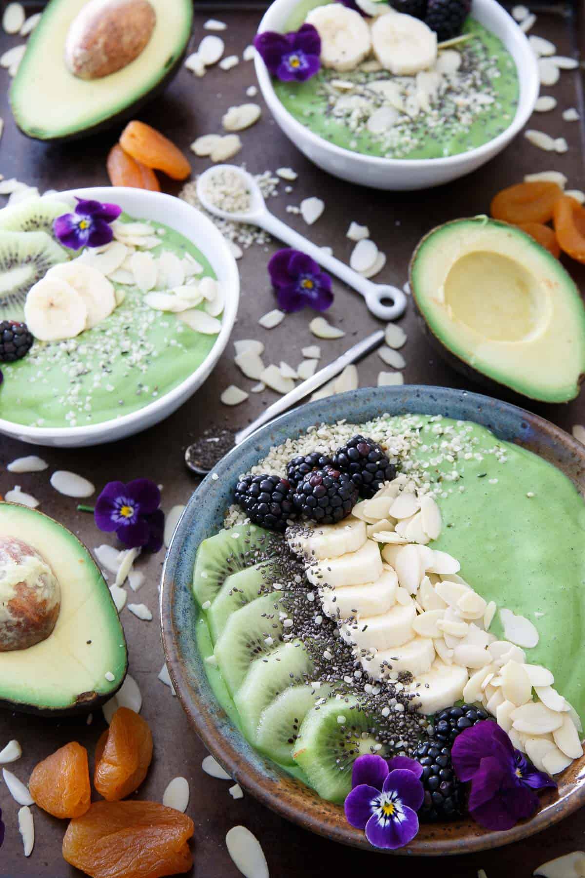 This avocado pineapple smoothie bowl is packed full of superfoods for a healthy start to the day. The topping choices are endless!