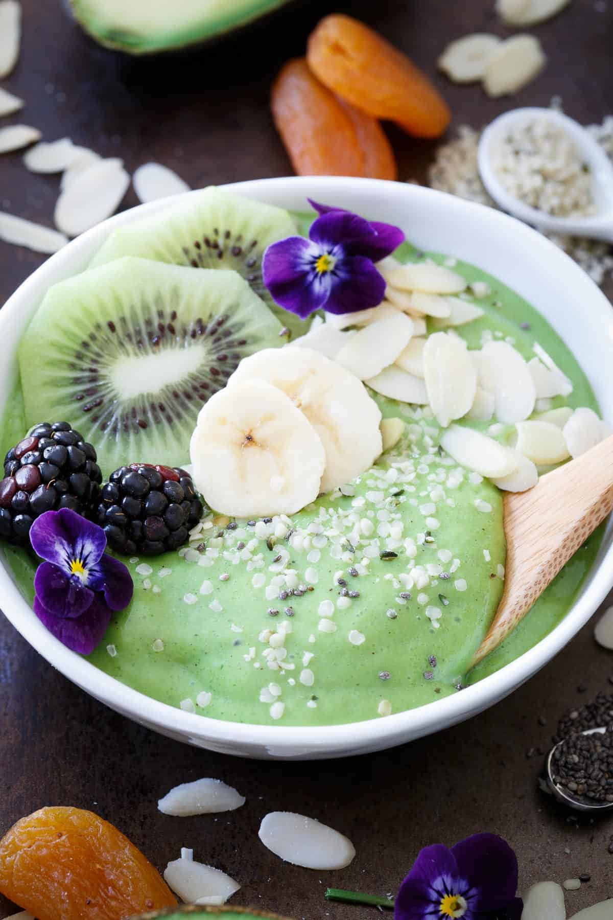 Avocado pineapple smoothie bowls are packed with superfoods and perfect for breakfast!