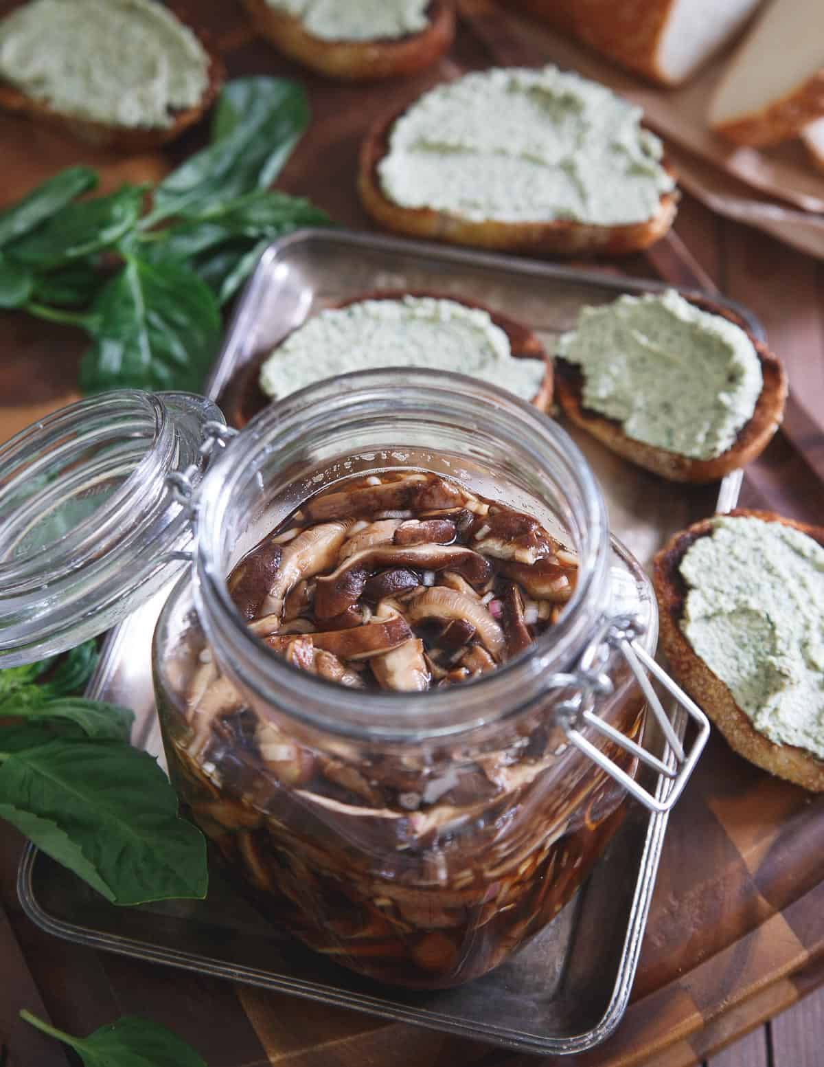 Balsamic Pickled Shiitake Mushrooms are a tangy bite perfect on top of some toasted bread.