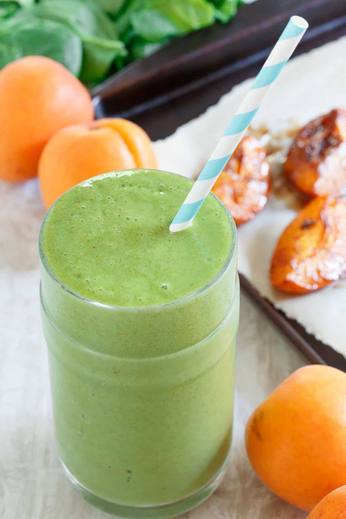 This roasted apricot smoothie gets a healthy green boost with spinach and natural spinach extract to help keep you feeling full longer!