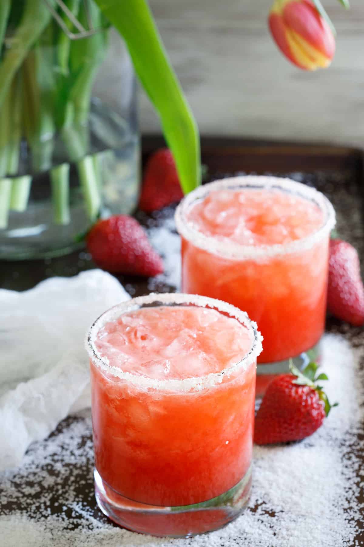 This salty dog cocktail recipe adds fresh strawberries for a spring twist to this classic drink. Perfect for Cinco de Mayo if tequila isn't your thing!