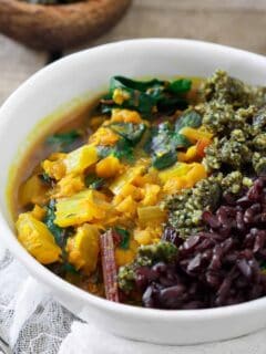 This turmeric lentil stew can be served with any grain you'd like for a hearty, health packed, comforting vegetarian meal.